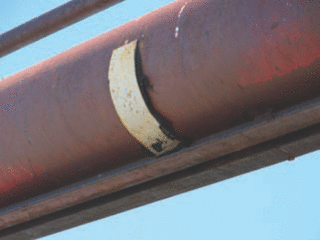 Patched auger tube