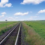 Railway tracks extending into the horizon.
