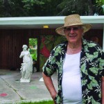 man standing near garden