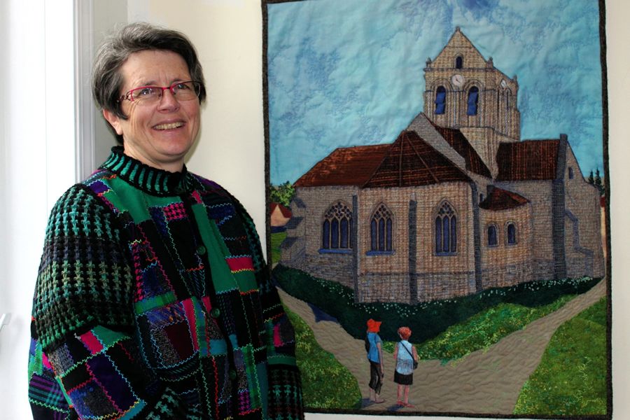 Cindy Hoppe with one of her pieces. 