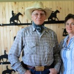 cowboy and wife in a living room
