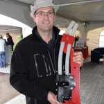 Garth Massie, corporate agronomist at Morris Industries holds the redesigned C2 Contour drill shank with a new opener, which is now made of injected polymer material.
