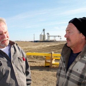 Curt Larsen (left) is the general manager at Northgate Terminal. Cameron Nordin farms near Oxbow, Sask.