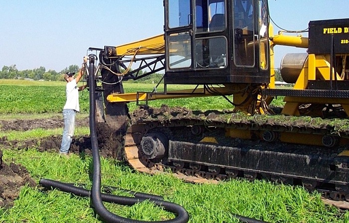 installing tile drainage in a field