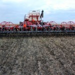 Advantages  of  using  a  vertical  tillage  implement  to  seed  include  smoothing  the  field  surface  while  incorporating  residue  and  removing  ruts. 