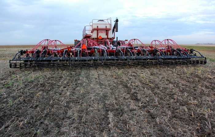 Advantages  of  using  a  vertical  tillage  implement  to  seed  include  smoothing  the  field  surface  while  incorporating  residue  and  removing  ruts. 