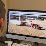 man sitting at computer