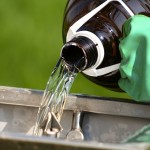 pouring farm chemicals