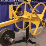 The BAM level-wind wire roller hooks into your tractor’s hydraulics to roll used barbed wire.