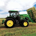 Deere’s Frontier equipment line includes a bale spear designed for large, square bales, which handle up to three at a time. Frontier will also offer a squeeze-type grapple attachment.
