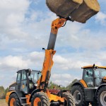 Telescopic handlers can lift loads to much greater heights than a standard ag tractor with front-end loader.
