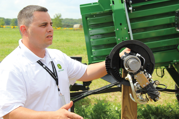 Louis Rodriguez points out the features of the Deere-designed, double-tie knotter.