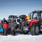 people in Antarctica with tractors