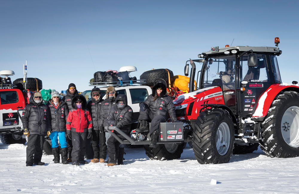people in Antarctica with tractors