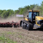 The Ontario-based Salford Equipment kicked off the field demonstrations at the first-ever Ag In Motion farm show near Saskatoon this week, showing how this 30-foot wide vertical tillage tool can be used to work in crop residue and open up the soil. Salford which had its roots in developing tillage equipment for corn and soybean production in Eastern Canada has expanded it’s machinery line over the past 10 years for Western Canadian farming conditions. Vertical tillage equipment is one of their most popular products although the company has also expanded into seeding and fertilizer application systems. With 320 acres of prairie crop land to work with, the Ag In Motion farm show was an excellent venue for many of the major tractor and field equipment manufacturers to demonstrate how their products performed in the field.