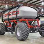 This new, model 4955 air cart, a 950-bushel version that tops out the 5 Series line, is equipped with the unique, ground-level canola loading feature.