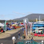 Australian farmers checking out machinery at AgQuip Field Days near Gunnedah, NSW.