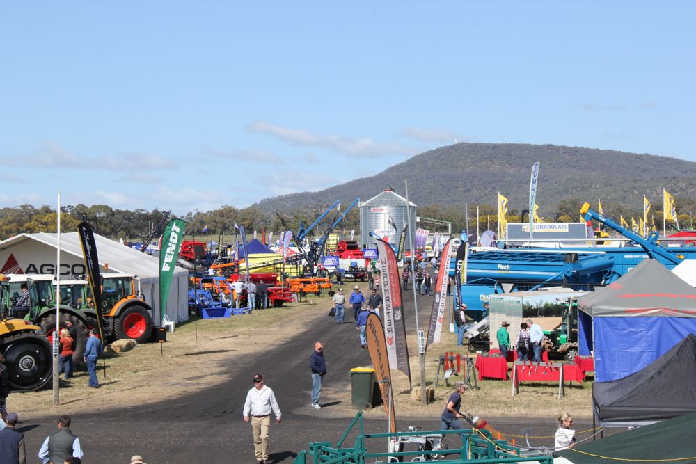 Australian farmers checking out machinery at AgQuip Field Days near Gunnedah, NSW.