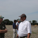 Scott Garvey chats with Craig Fenstermaker, New Leader product specialist, at Ag in Motion in July.