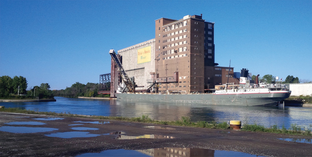 A laker vessel sits docked at the grain terminal awaiting filling.
