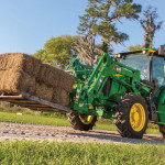 John Deere’s 5085E and 5100E four-cylinder tractors get more improvements to make them better suited to loader operations.