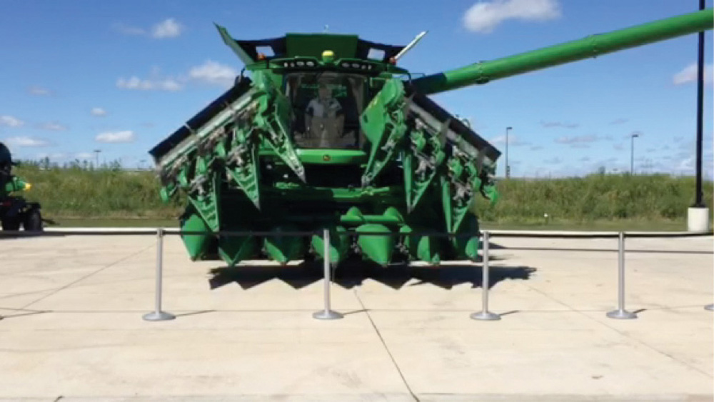 The operator can fold up the new 12-row corn header directly from the cab, saving transport time.