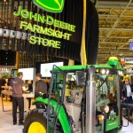 John Deere displayed a couple of cut-down tractors like this one that people could get into and experience sitting at the controls.