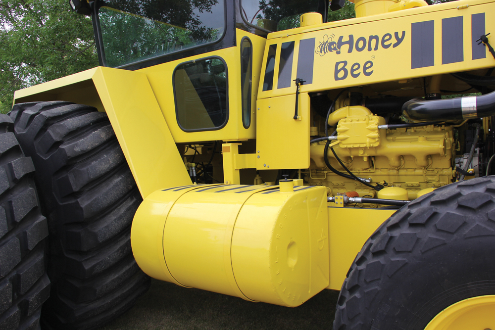 A redesigned pickup truck slip tank is used for the tractor’s fuel tank.