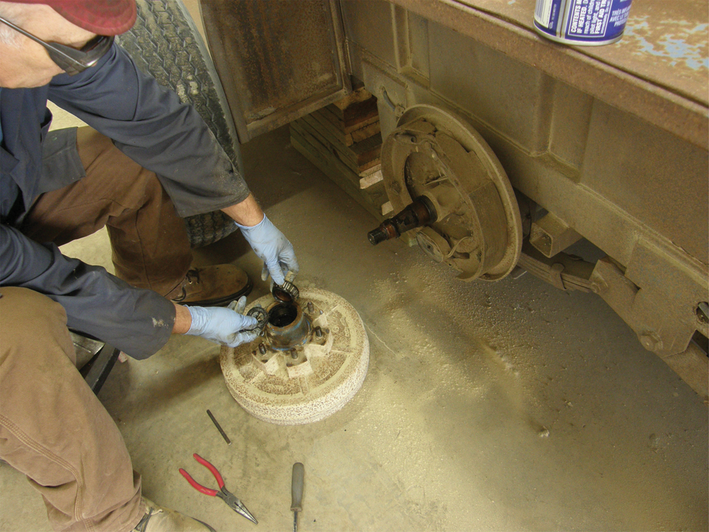 Be ready to catch the outer wheel bearing when removing the drum. It will fall out.