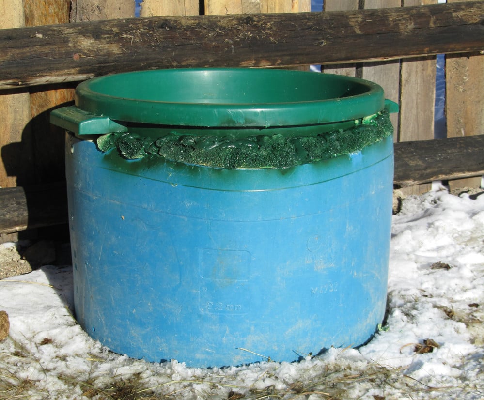 Once the tubs and insulation are assembled, trim away some of the excessive spray foam insulation and apply paint to the top edge, which helps to protect the foam.
