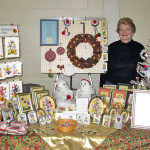 Carol Schroeder with her artworks.