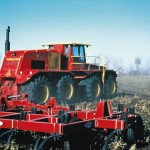An 80-foot cultivator was built by Friggstad to create a load for the tractor during field trials.