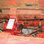 The tractor rode on suspension that used a walking beam with coil springs above each axle. 