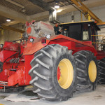 Workers continue the teardown process. 