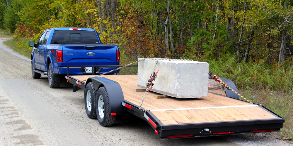 Each full size pickup, like this Ford with a 2.7 litre EcoBoost engine, had to pull a 2,727 kilgram (6,000 pound) trailer.