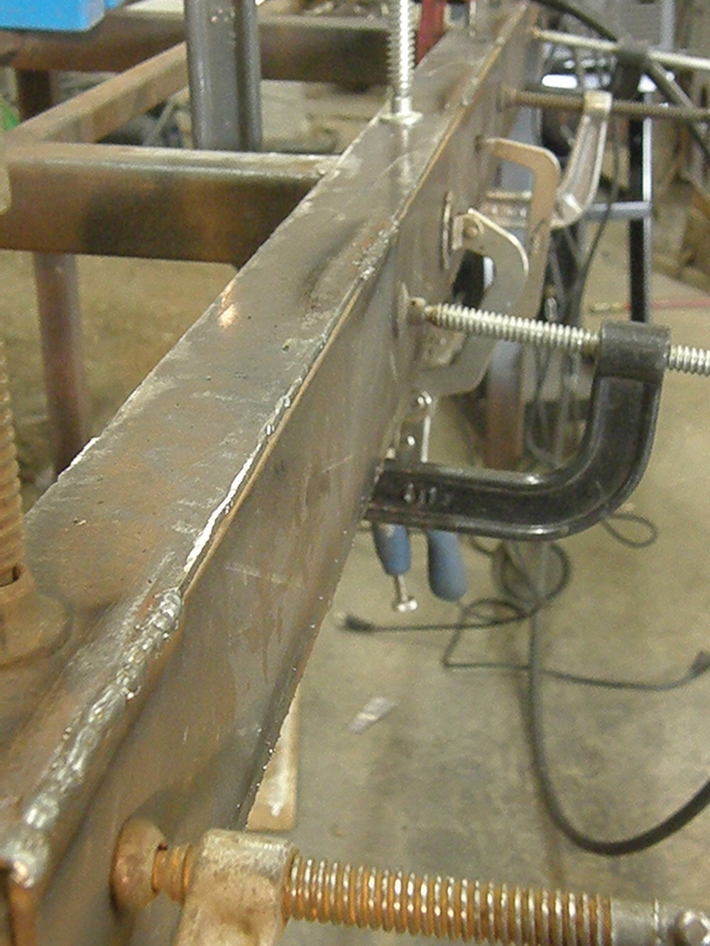 Welding was spread out along the length
of the joint to prevent concentrating heat into one area and warping the metal.