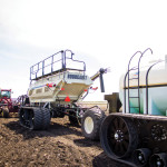 Elmer’s Manufacturing of Manitoba says its study shows converting grain carts to track systems can save 11 to 15 per cent in fuel consumption rates.
