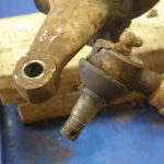 Tie rod ends have a tapered design that allows them to fit and stay tight when installed. Before removing an old tie rod end for replacement, count the number of exposed threads. Install the new one leaving the same number of threads exposed.