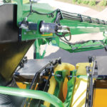 The conveyors on Deere carts are now mounted on arms with five pivot points that allow for more manoeuvrability and easier loading of all tanks from one delivery location under a truck.