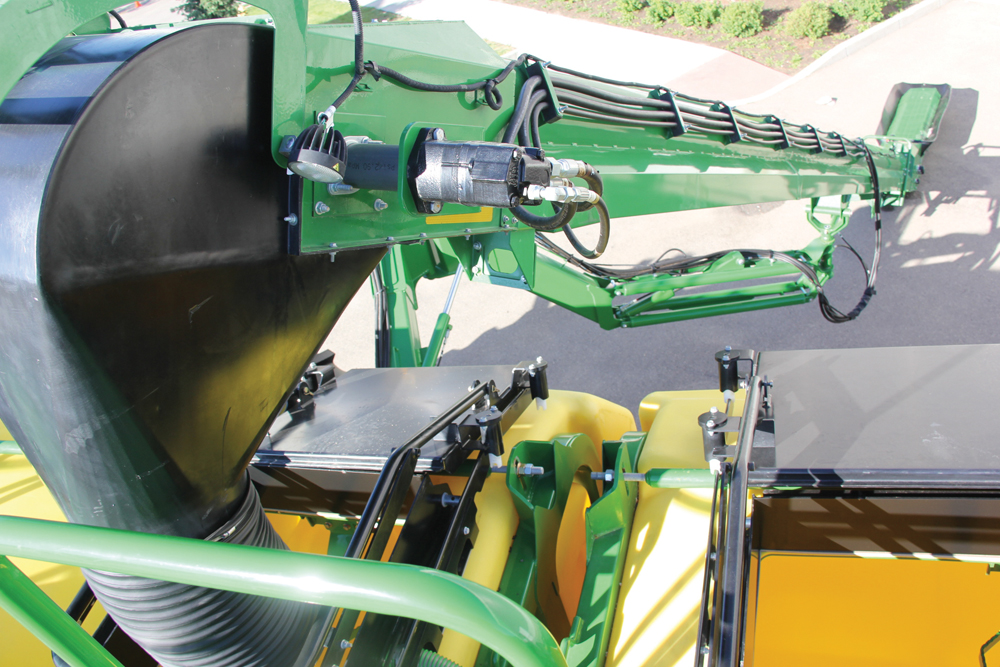 The conveyors on Deere carts are now mounted on arms with five pivot points that allow for more manoeuvrability and easier loading of all tanks from one delivery location under a truck.