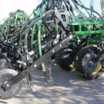 Packing and trip pressure on the openers can be set from the tractor cab.