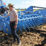 Lukas Voss demonstrates how to adjust the position of the harrow tines on the Rubin 12.