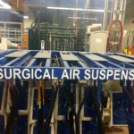 Dr. John Campbell shows off the vet school's tilt table for cattle. The current table is based on an original built by a Humboldt farmer.