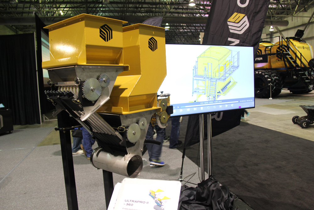 On display during Canada’s Farm Progress Show in Regina, a mock up of the new meter design stands beside a computer CAD image that shows what a full-scale version will look like. 