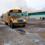 Ash coats Turtleford's streets as the elevator burns behind the Co-op grocery store.