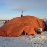 Insulated tarps and a heater made tractor repairs possible even when temperatures dipped to -30 C.