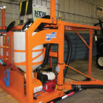 The PhiBer Dash system allows operators to pre-meter chemicals to match exact tank mix recipes then easily feed them into the sprayer fill line.