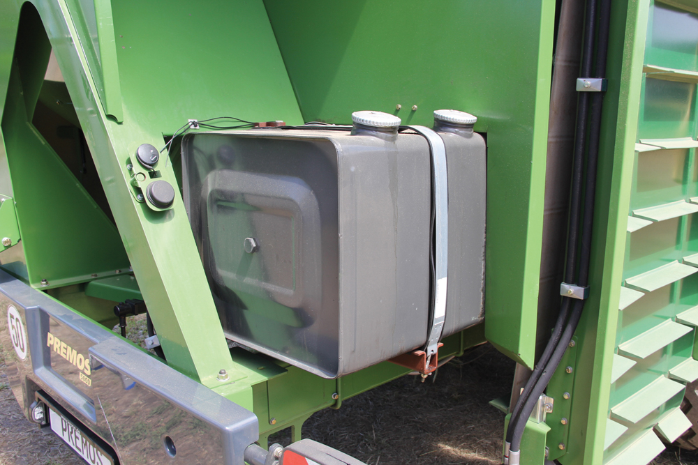 This tank stores vegetable oil, which is used to lubricate the forming rollers. That makes initial start up easier and reduces power demands on the tractor.