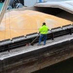 Cargo ship loading grain