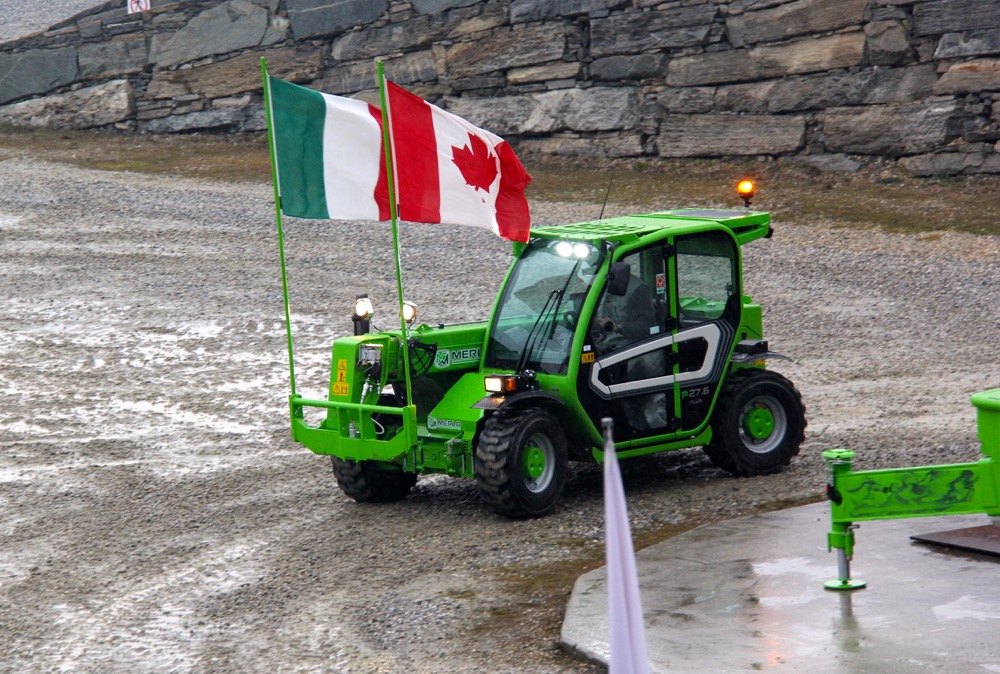 A company employee drove a telehandler around the demonstration course flying an Italian and Canadian flag to welcome Canadian dealers and customers.